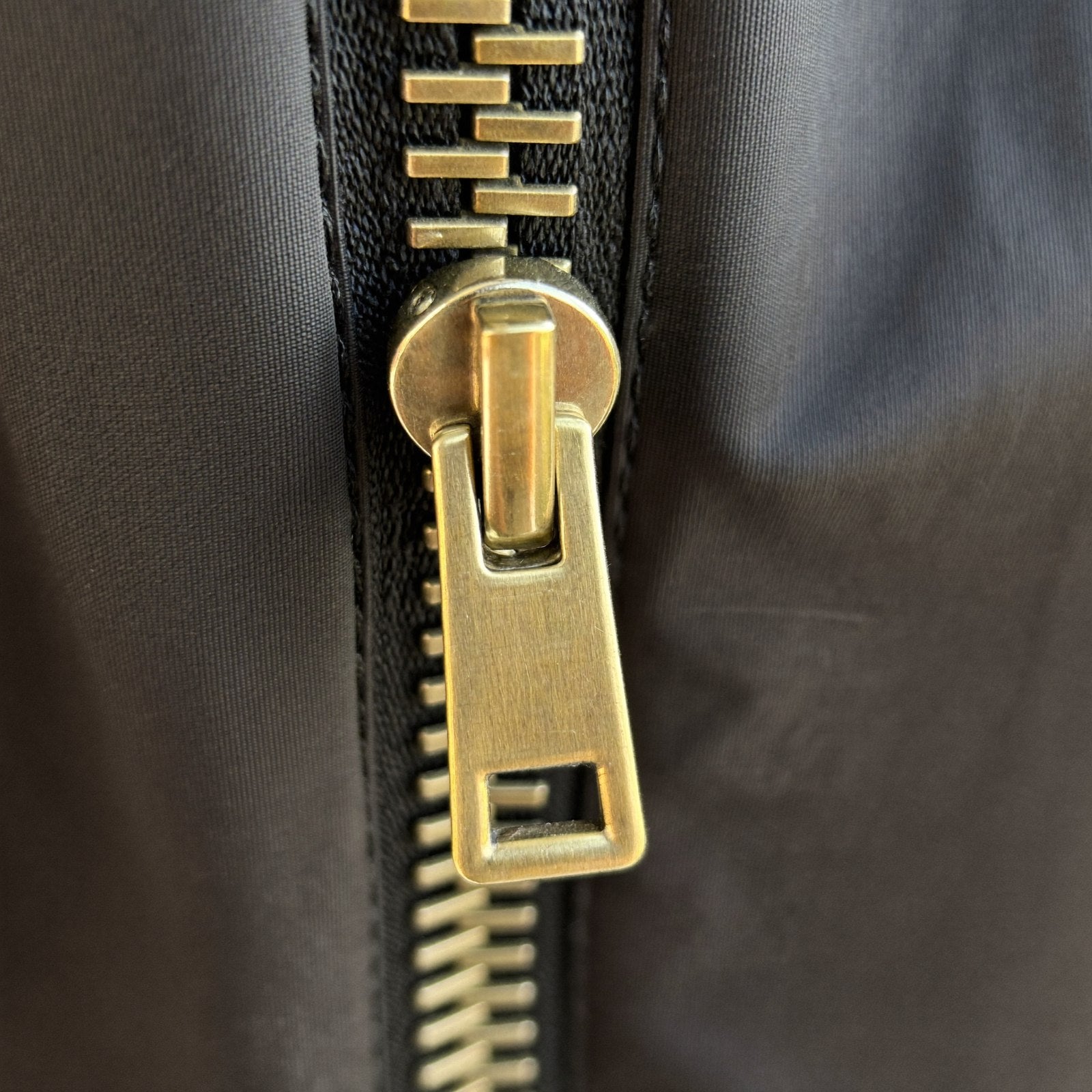 Bowryn brass zipper hardware close-up - materials detail