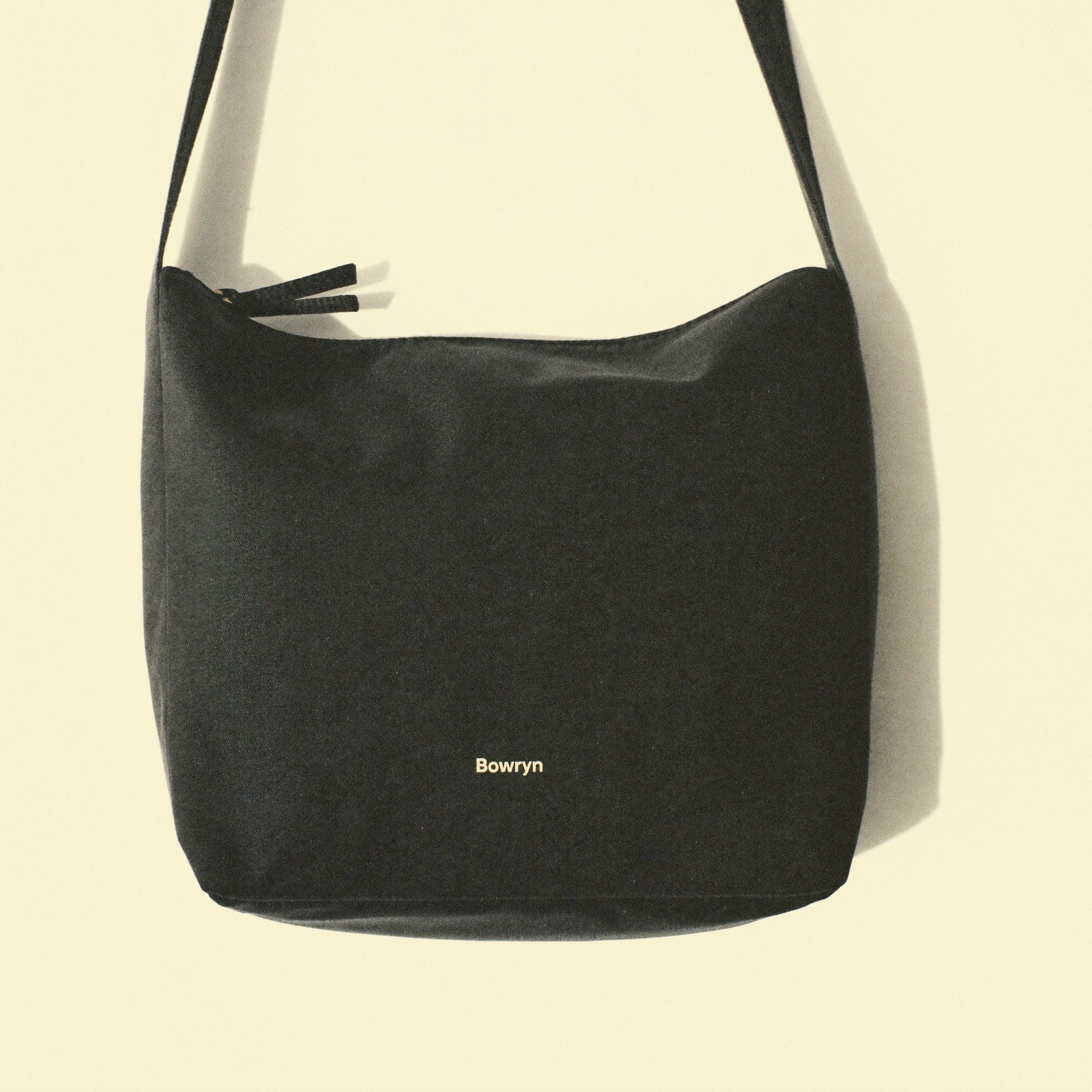 The Shoulder Bag front view — premium cream nylon Bowryn shoulder bag