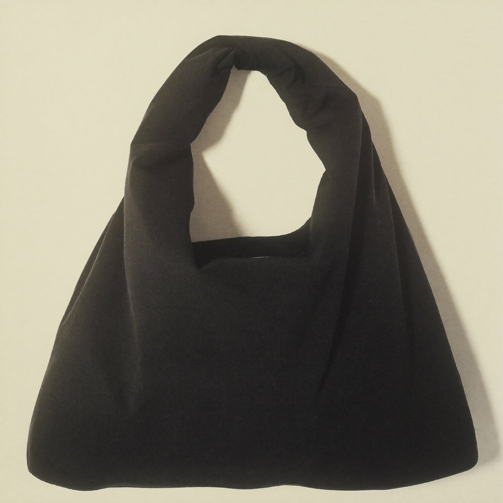 The Slouch front view — premium cream nylon Bowryn slouch bag