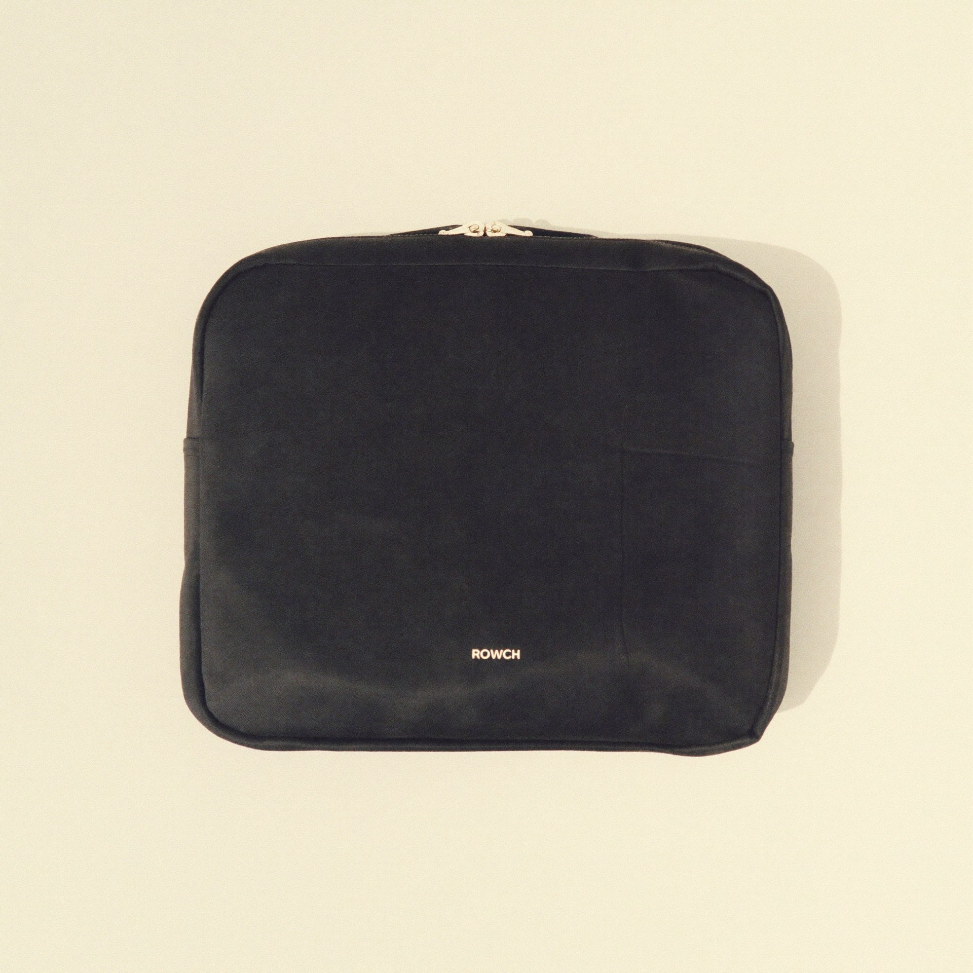 The Pouch evening clutch front view — premium black nylon Bowryn