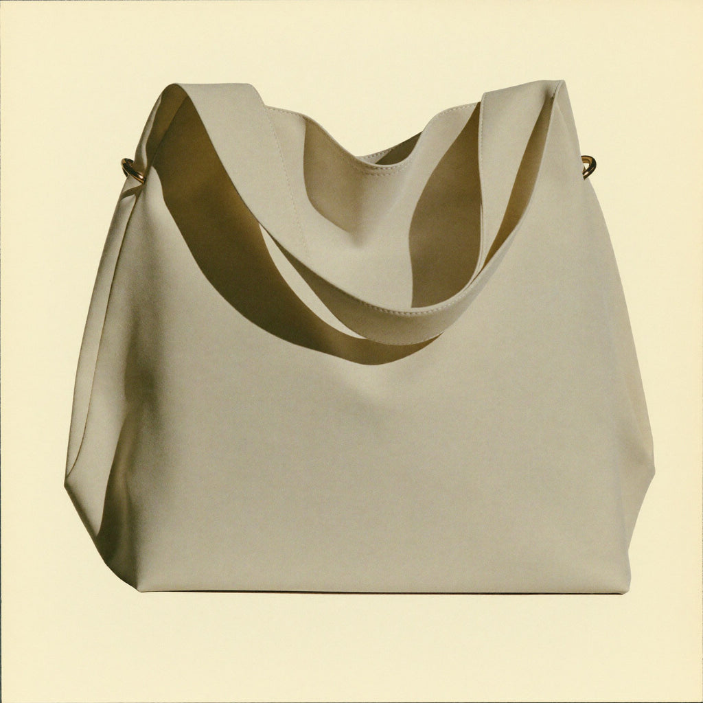 The Tote 3/4 angle showing depth and brass hardware detail