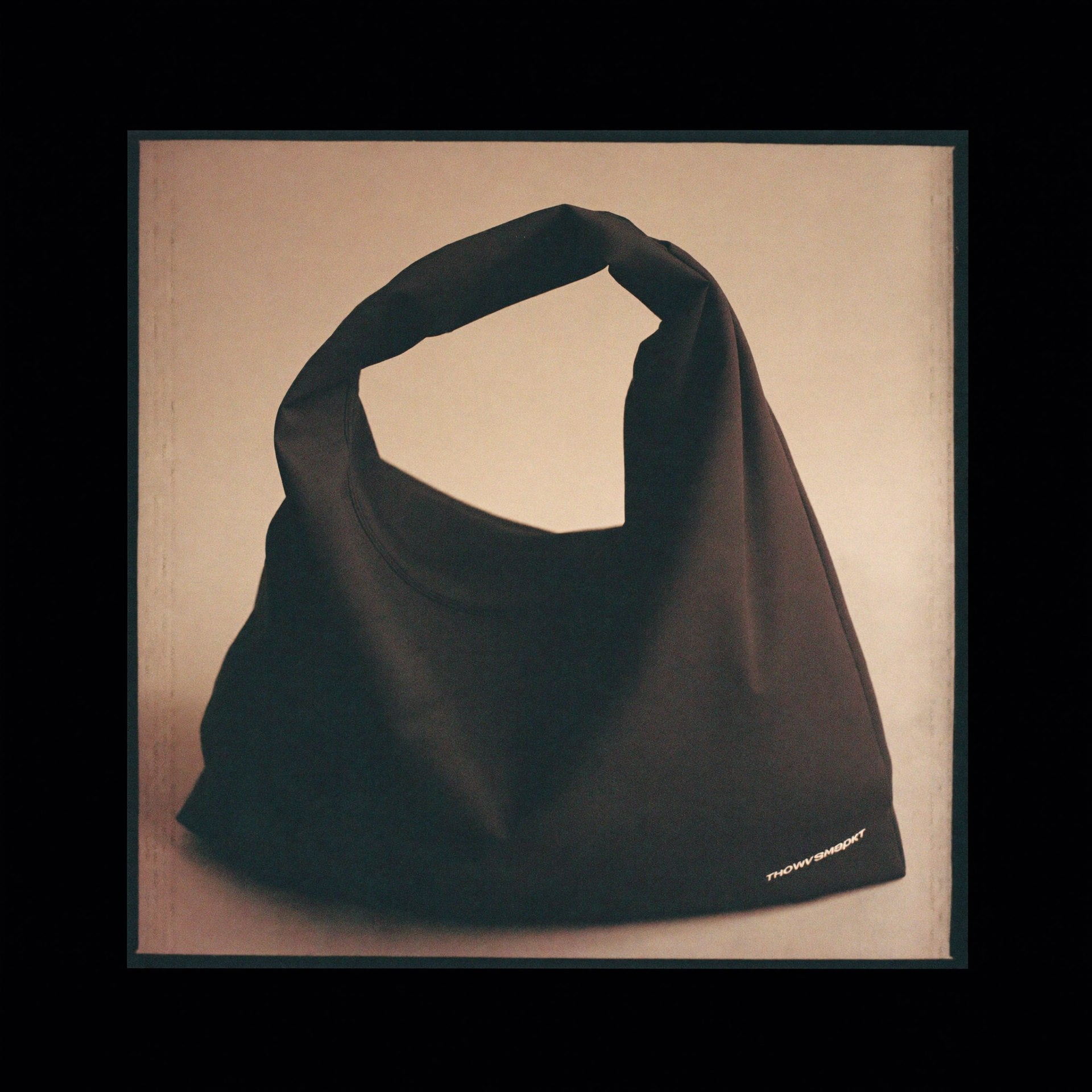 The Slouch 3/4 angle showing soft slouchy drape