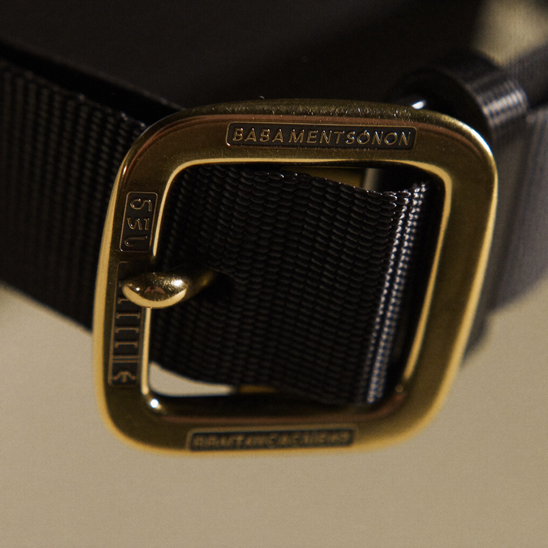 Macro detail of front zipper and side flap pockets on The Shoulder Bag