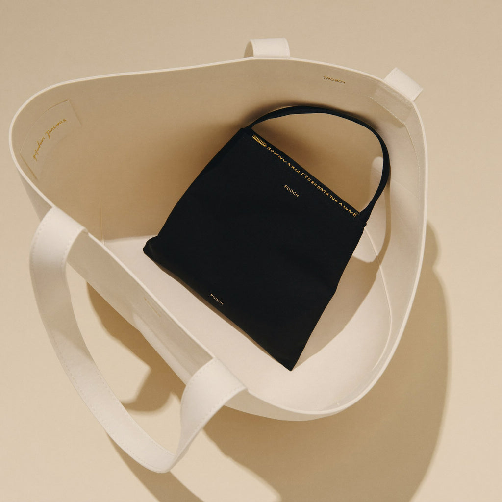 The Pouch resting inside The Tote — in-bag organizer use case