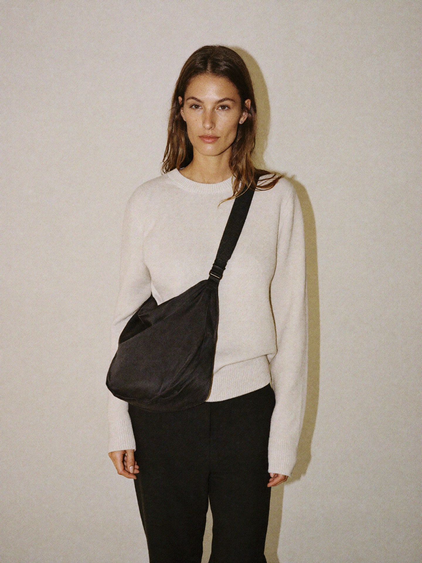 The Shoulder Bag crossbody on body scale reference